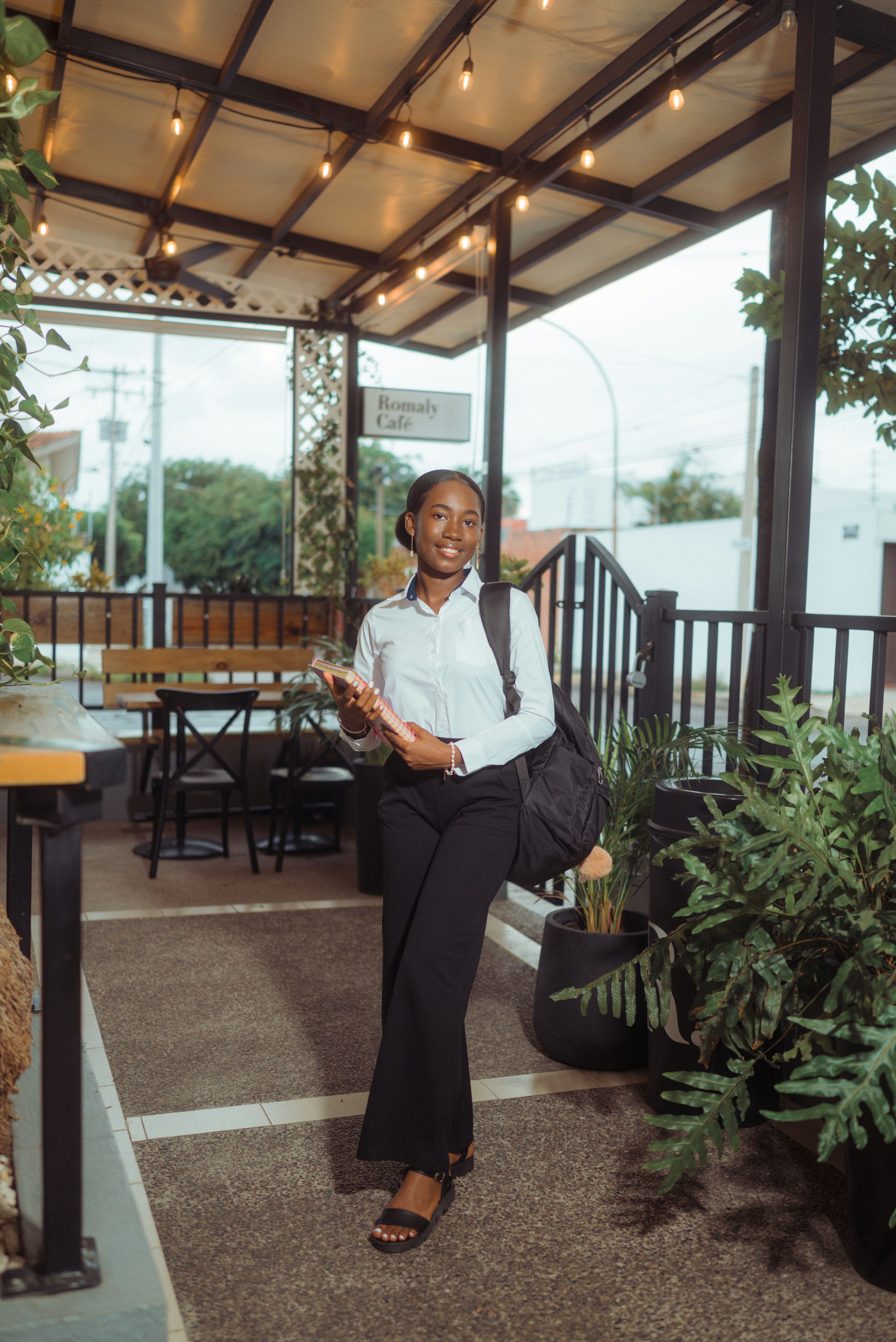 Small business owner outside her shop